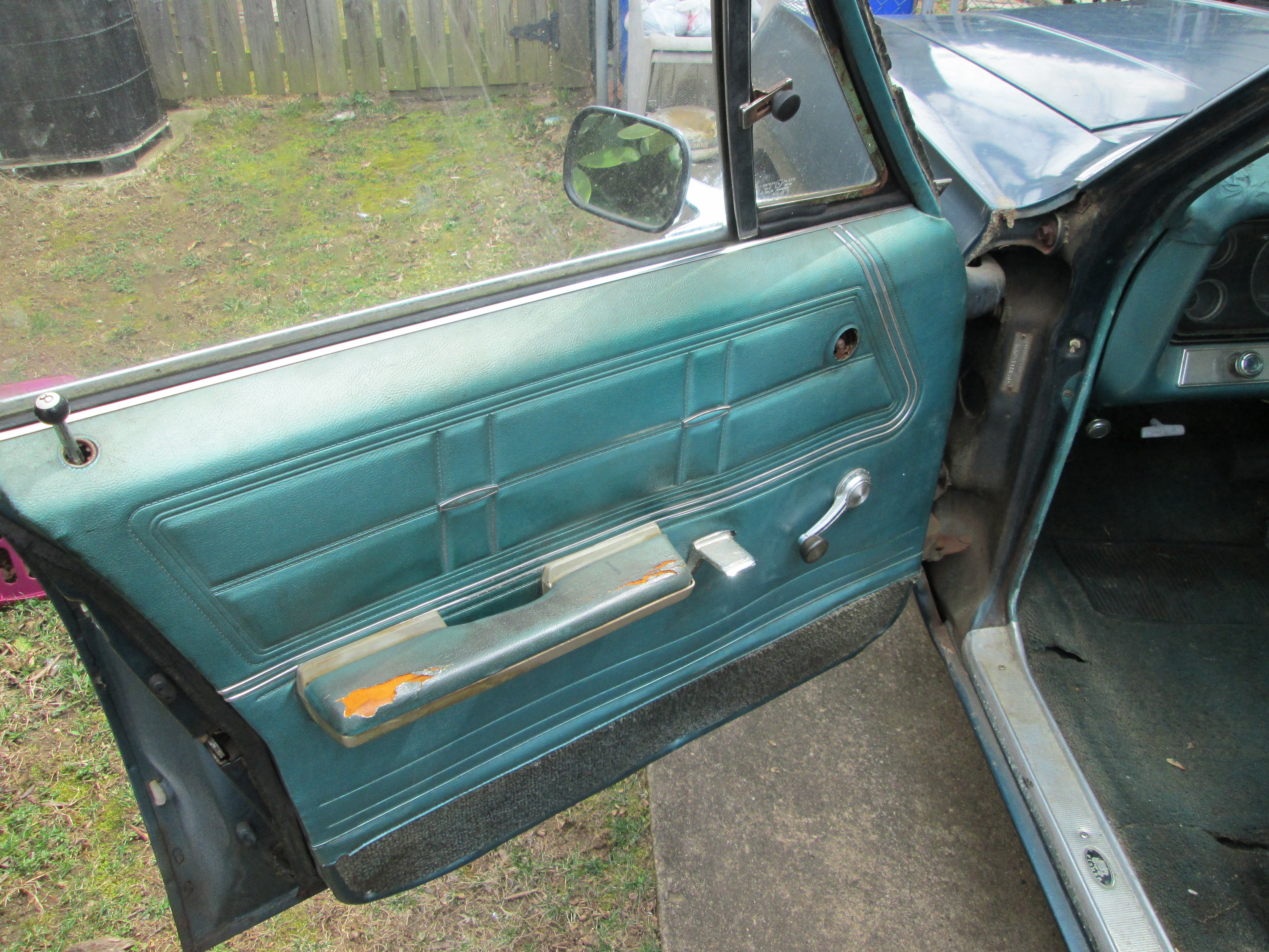 Driver side front door, needs new window cranks and weather stripping